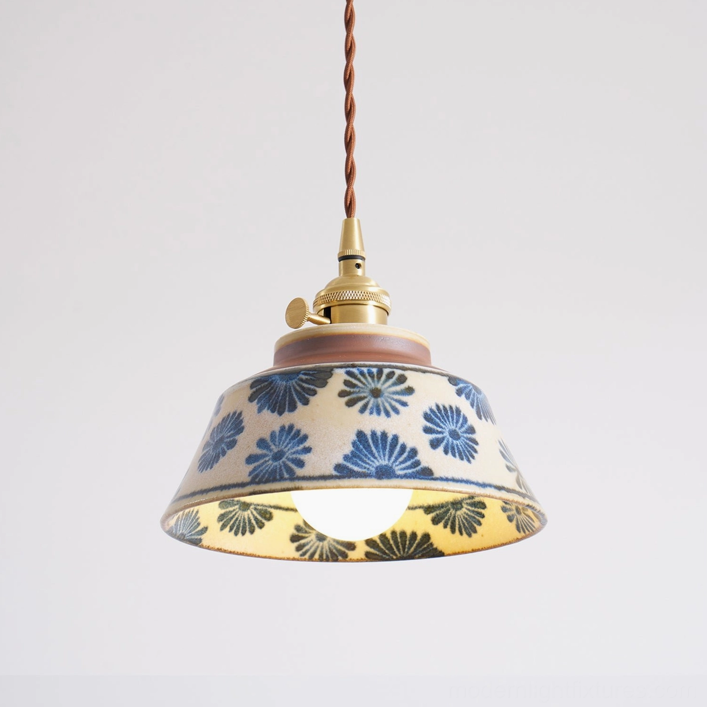 Room transformation before and after showing impact of ceramic pendant light on space design