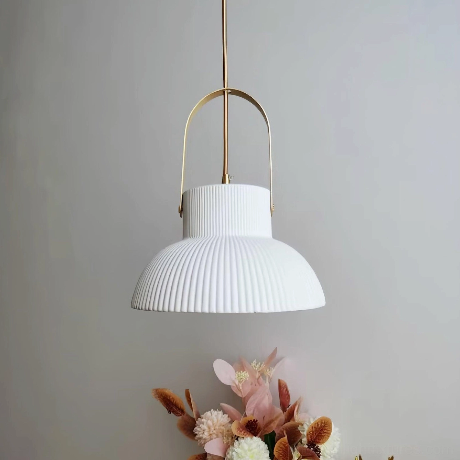 Large diameter ceramic pendant lamp with pronounced ribbed texture in living space