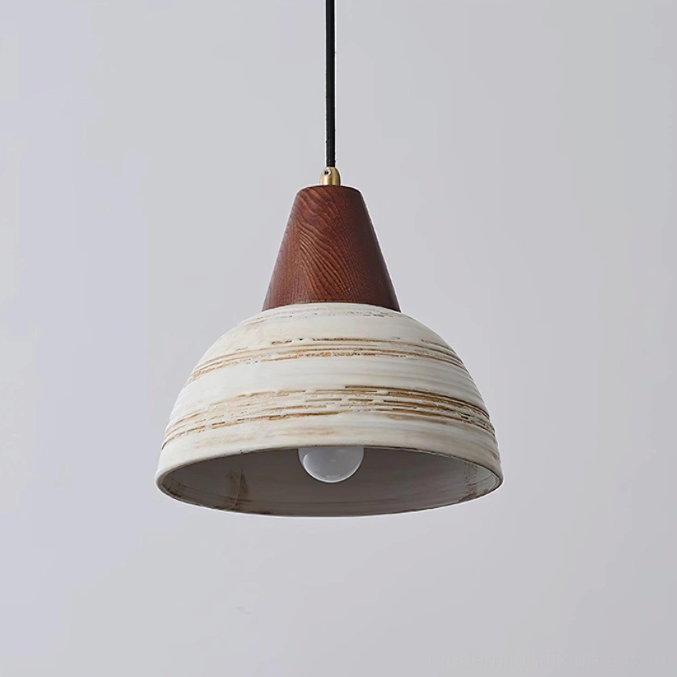 Ceramic pendant light with visible warm LED bulb inside distressed white ceramic shade