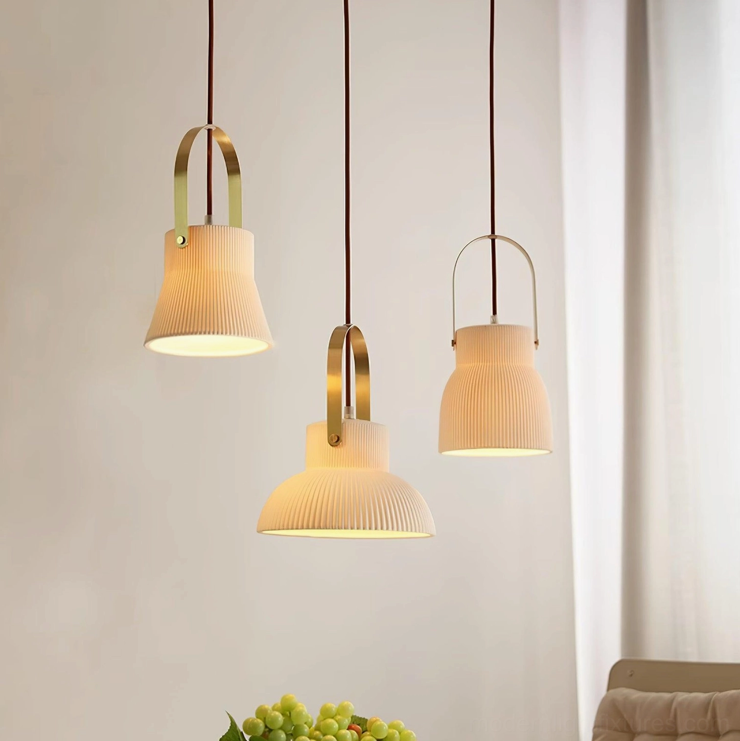 Ceramic pendant light fixture with pronounced ribbed texture and warm illumination