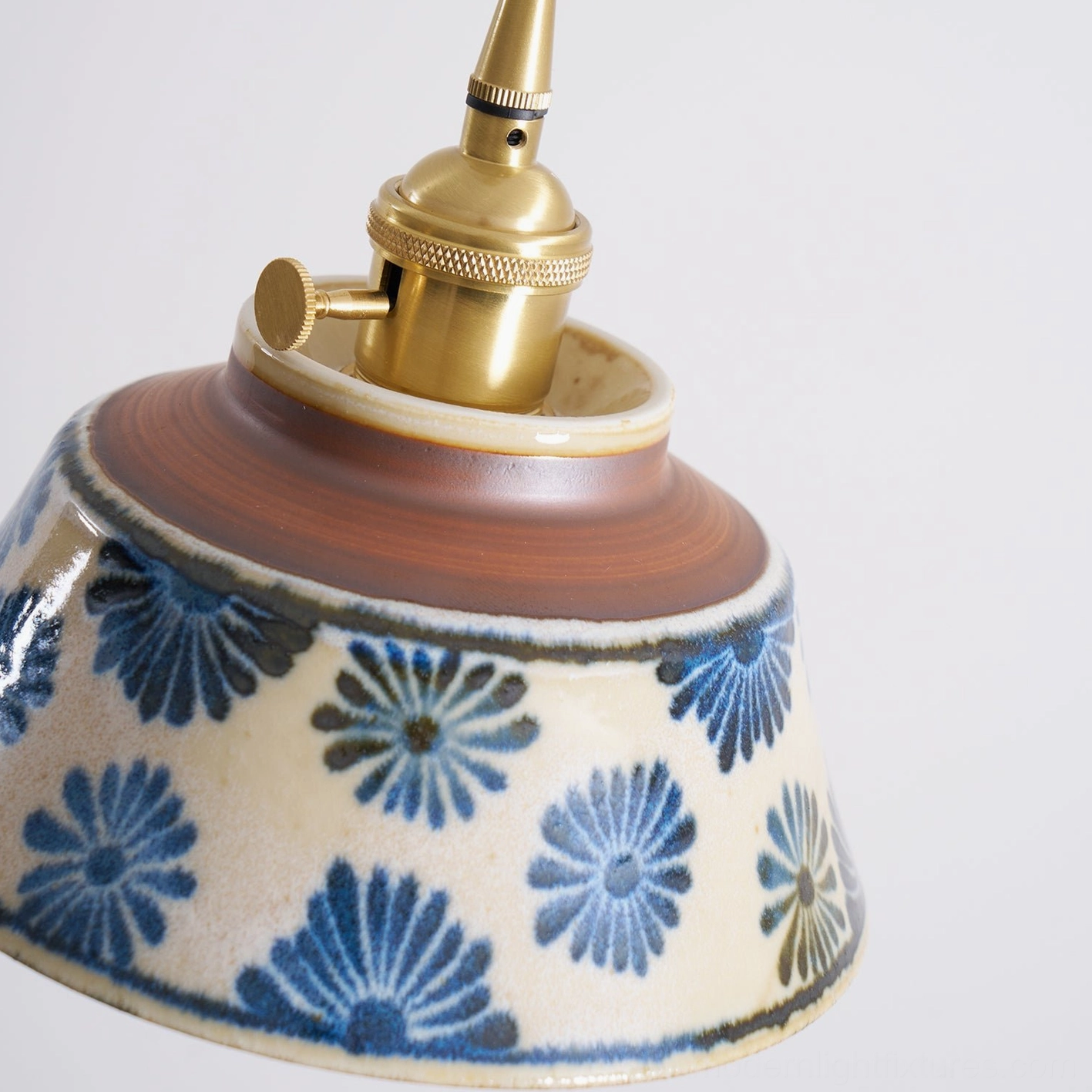 Size comparison diagram for hand-painted ceramic pendant light with measurement references