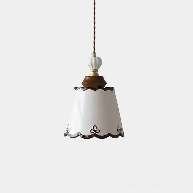 Vintage ceramic pendant light with white glossy finish and brown scalloped trim, featuring hand-painted floral decorative motifs