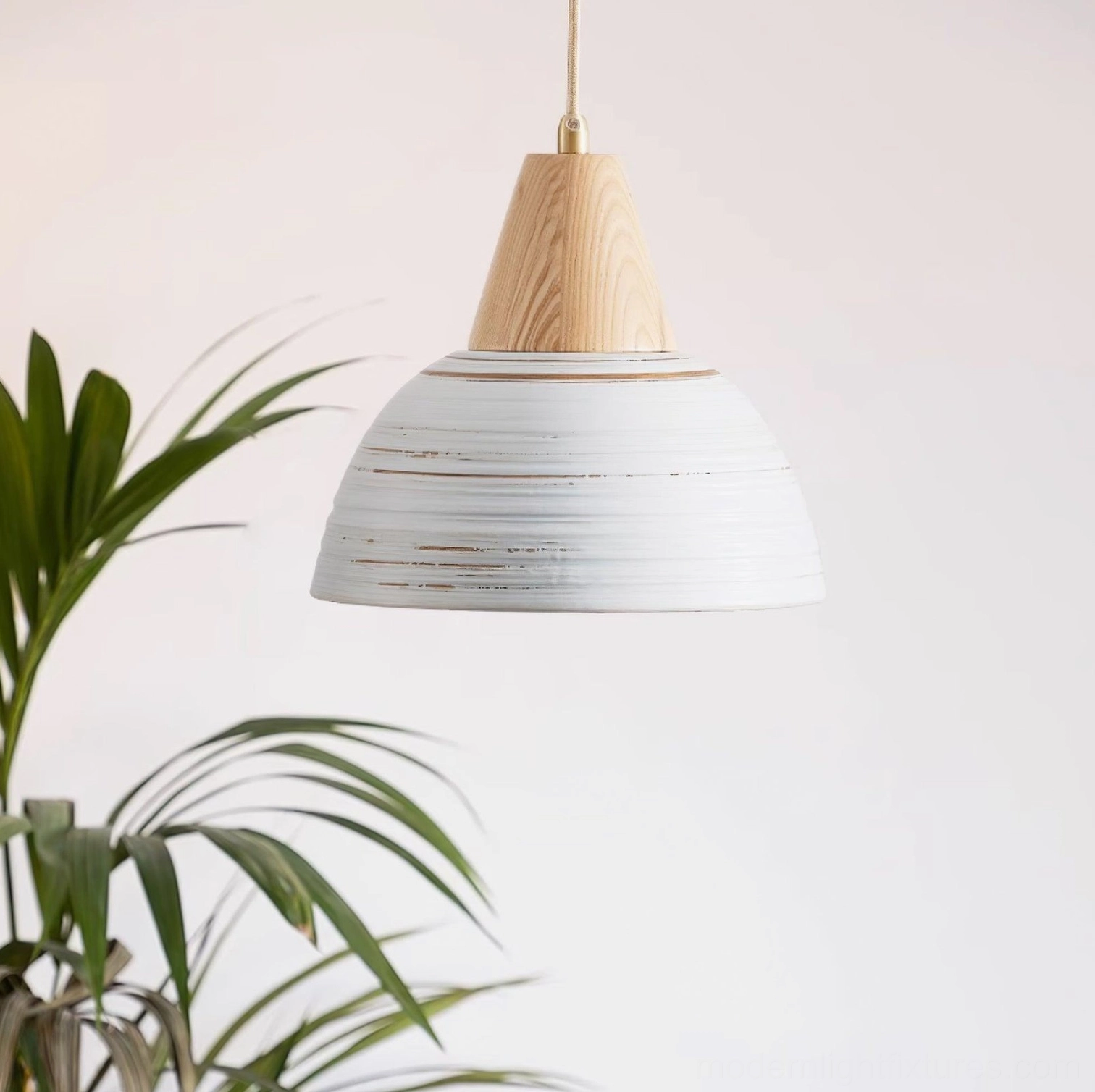 Artisanal ceramic pendant fixture showing natural wood and ceramic material combination