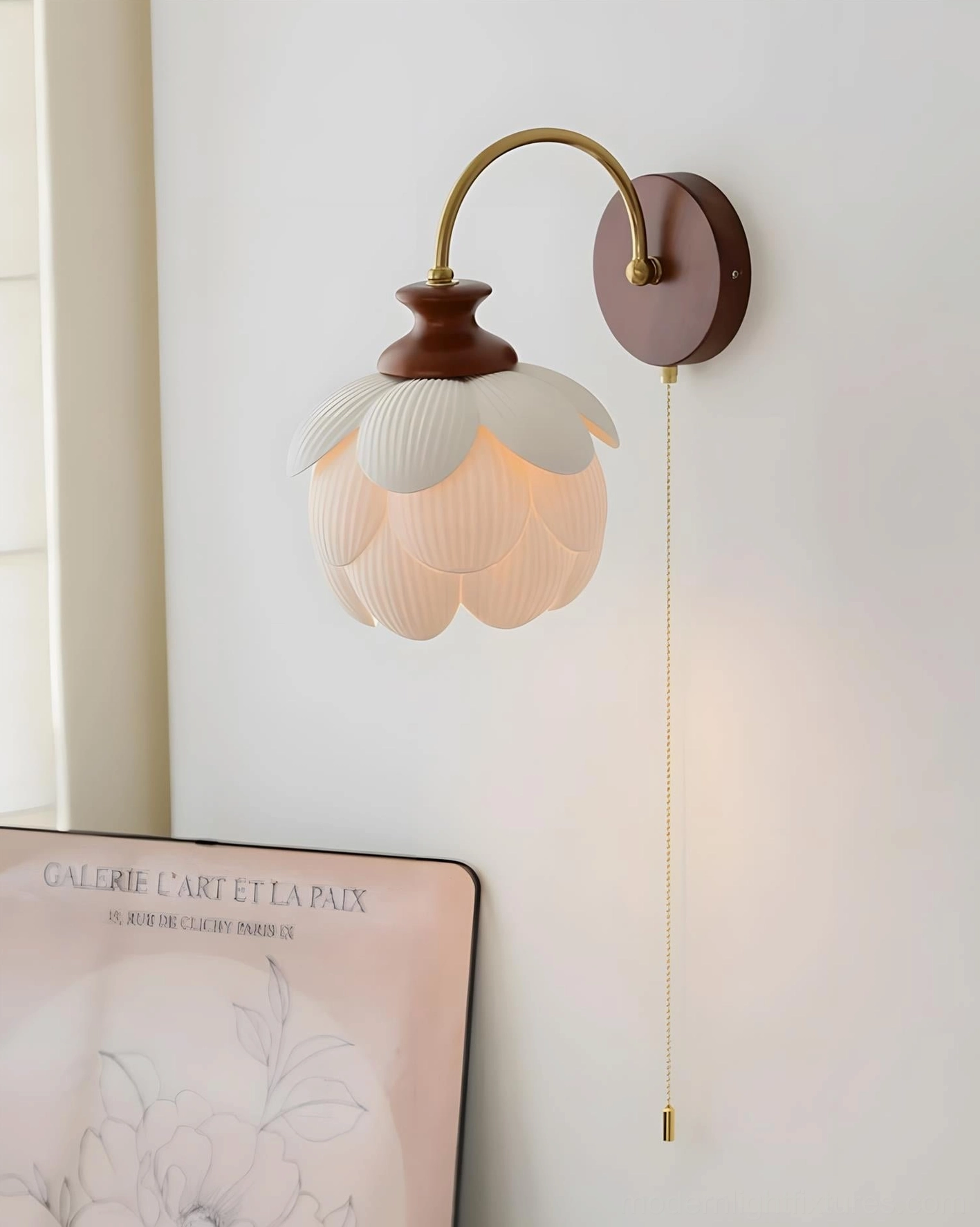 Close-up detail of hand-shaped ceramic lotus petals on wall sconce showing glaze finish and light diffusion design