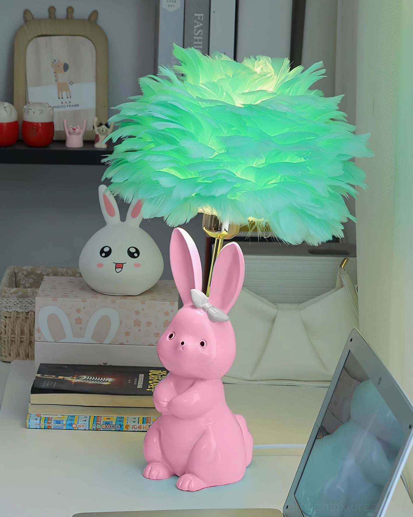 Pastel ceramic rabbit base lamp with warm feather lampshade and decorative bow detail