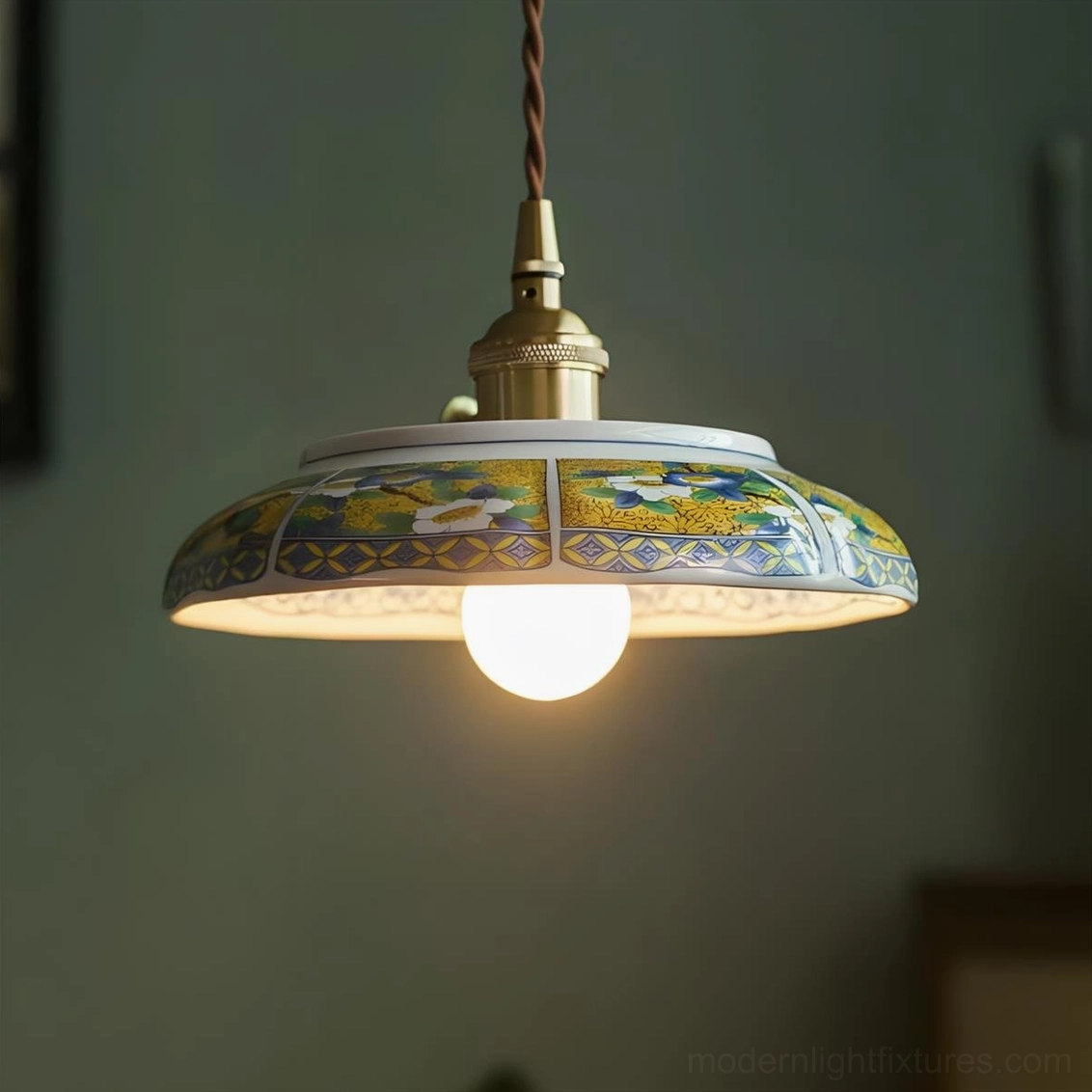Side profile of hand-painted ceramic saucer pendant showing shallow 1.6-inch height and 8.1-inch diameter proportions