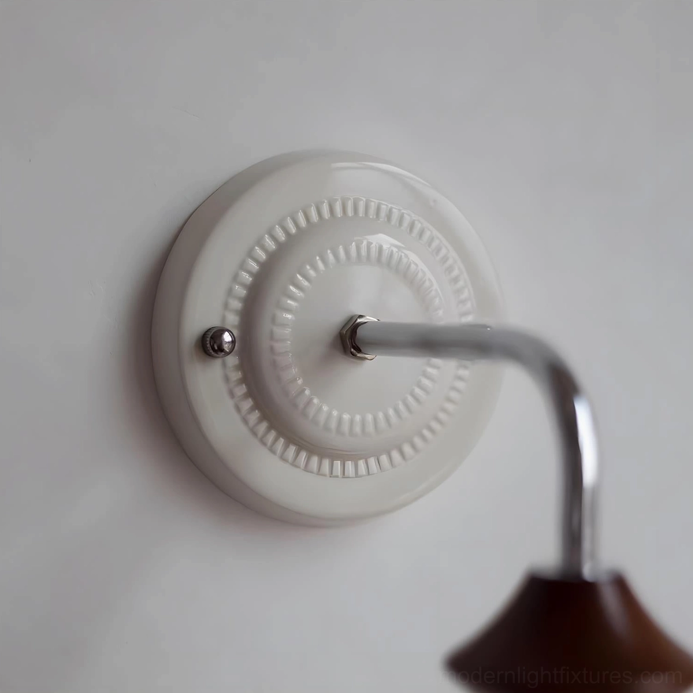 Warm-toned ceramic floral sconce with walnut wood accent creating mid-century modern atmosphere