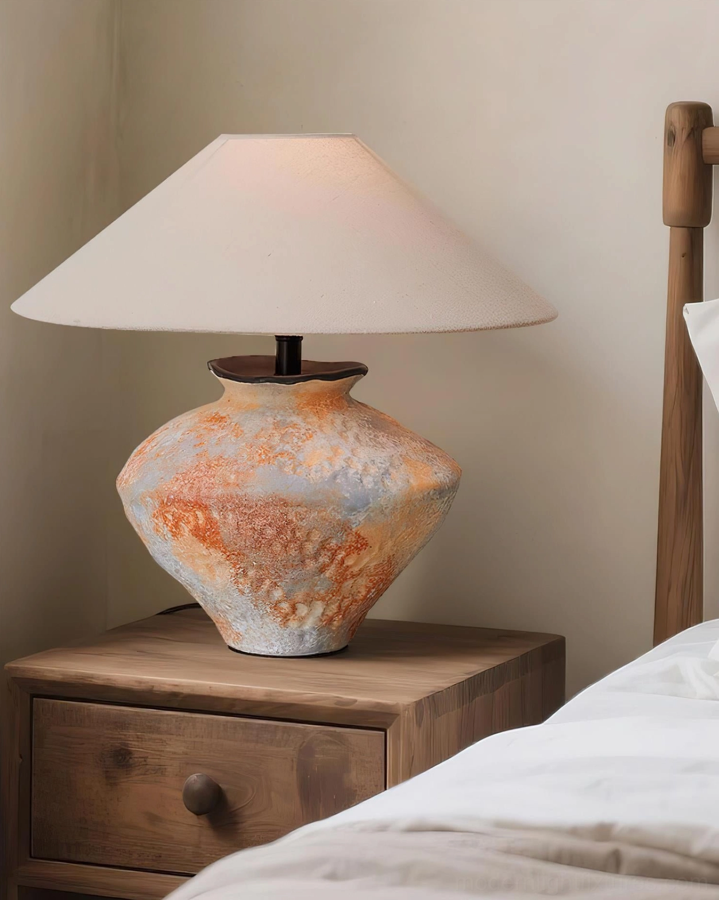 Textured ceramic table lamp wabi-sabi artisanal base close-up detail shot