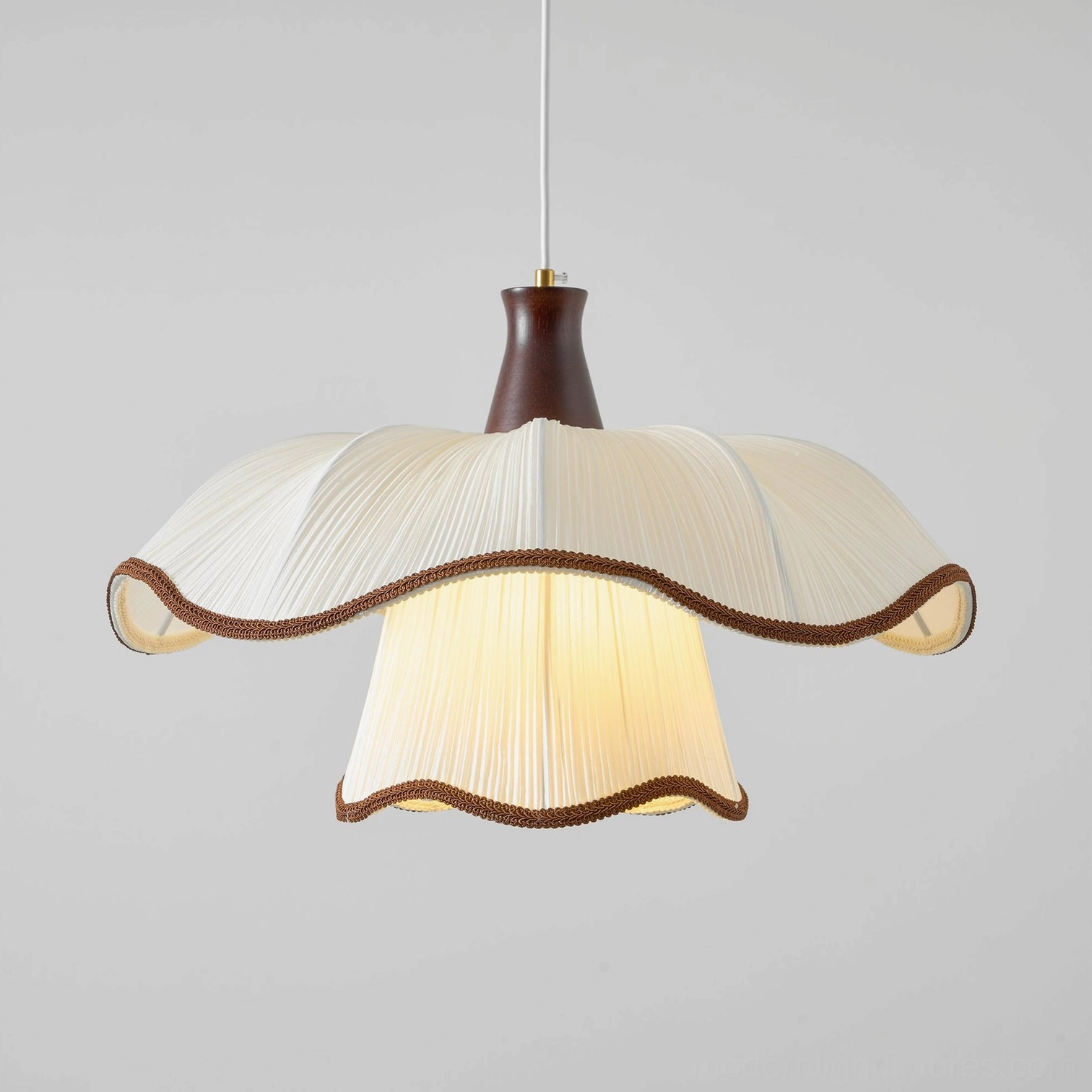 Ceriva ruffled fabric pendant lamp warm diffused lighting in elegant interior