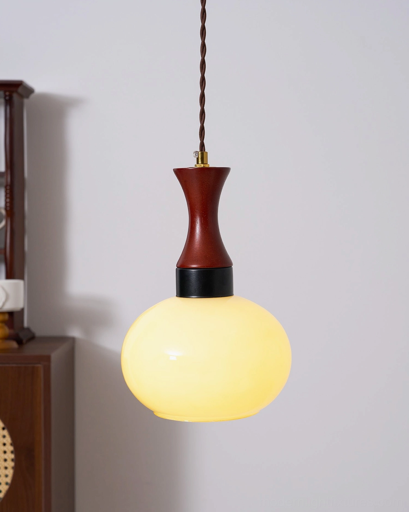 Chara hanging pendant lamp creating focal point in styled interior space