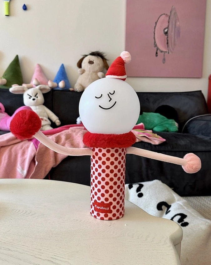 Red polka dot character lamp living room sofa side table close-up cozy home décor
