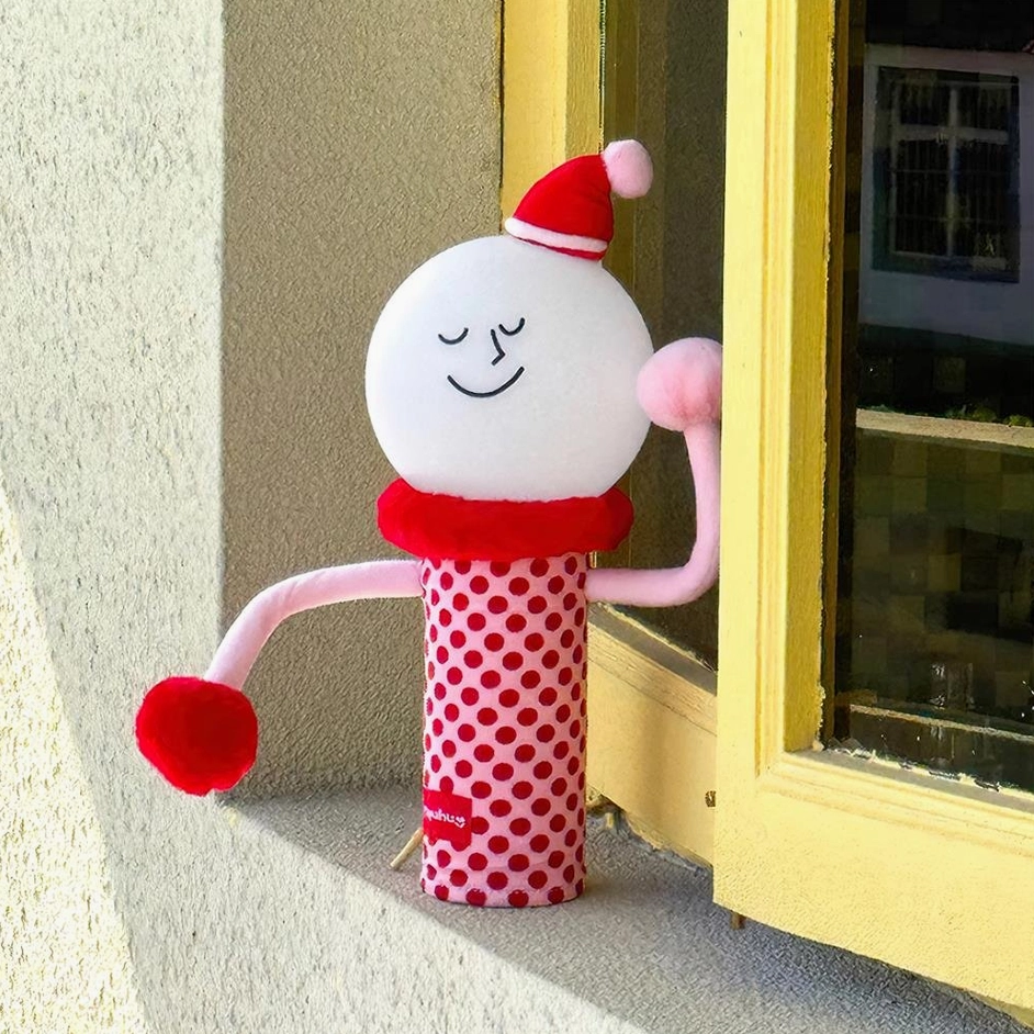 Red polka dot playful character lamp three-quarter outdoor window scene side view