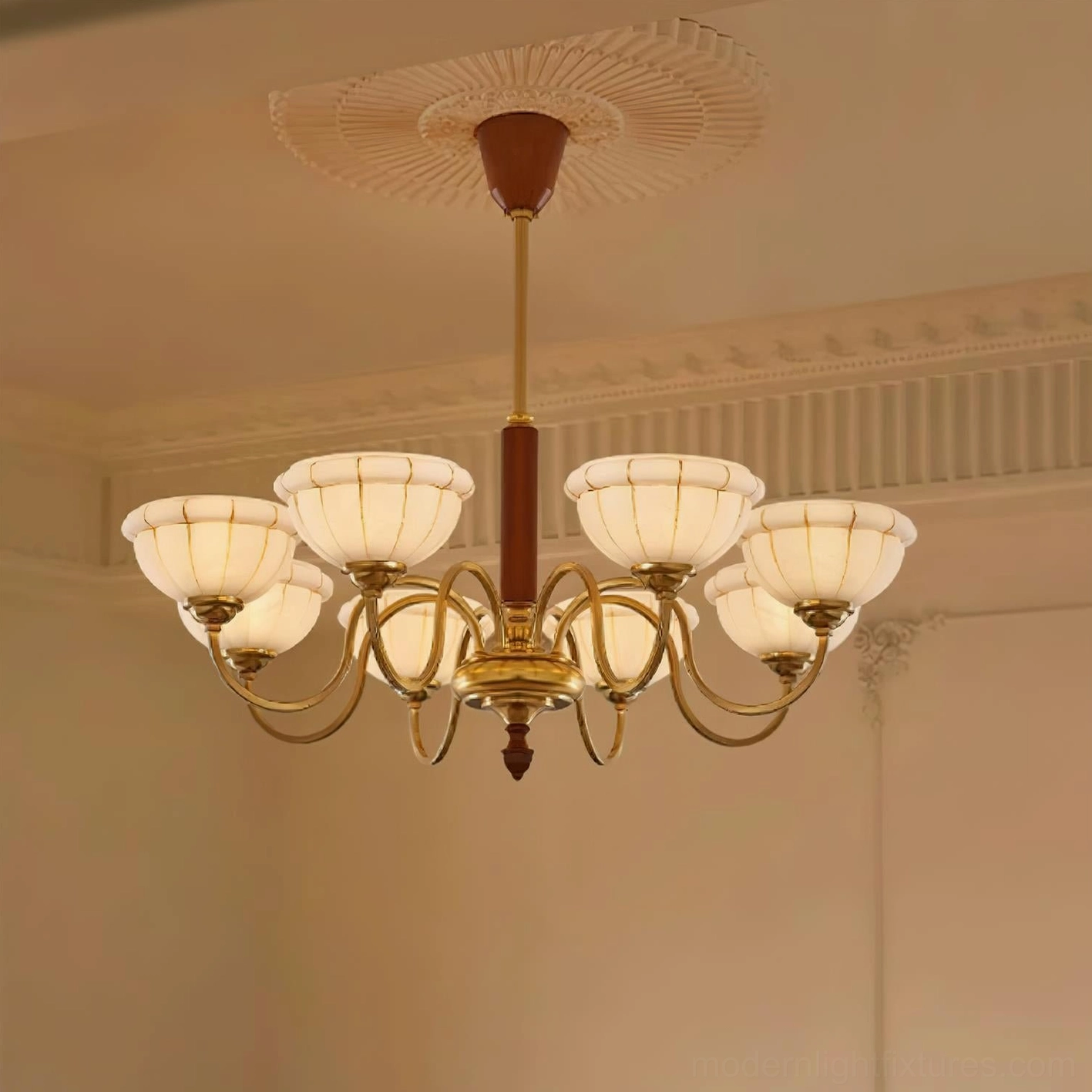 Charlie chandelier showing gold brass finish and walnut wood central support rod construction