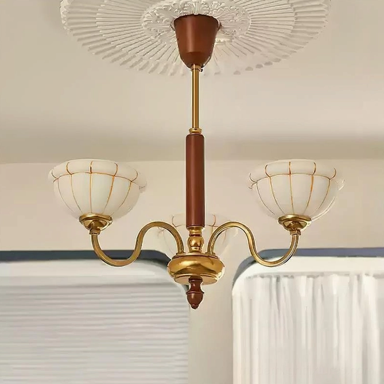 Three-head and four-light Charlie chandelier variants showing compact brass frame with walnut wood pole