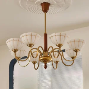 Eight-head Charlie chandelier overhead installation view with ribbed ceiling rose and warm ambient lighting