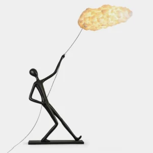Chasing Clouds modern floor lamp with black resin humanoid base and soft white cloud-inspired lampshade, front studio view