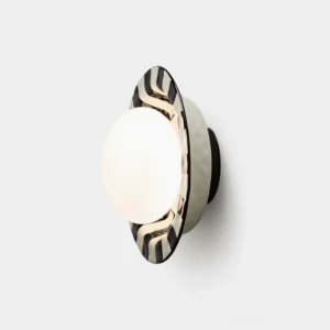 Checker wall sconce front three-quarter view showcasing opal glass sphere and striped decorative ring modern geometric design
