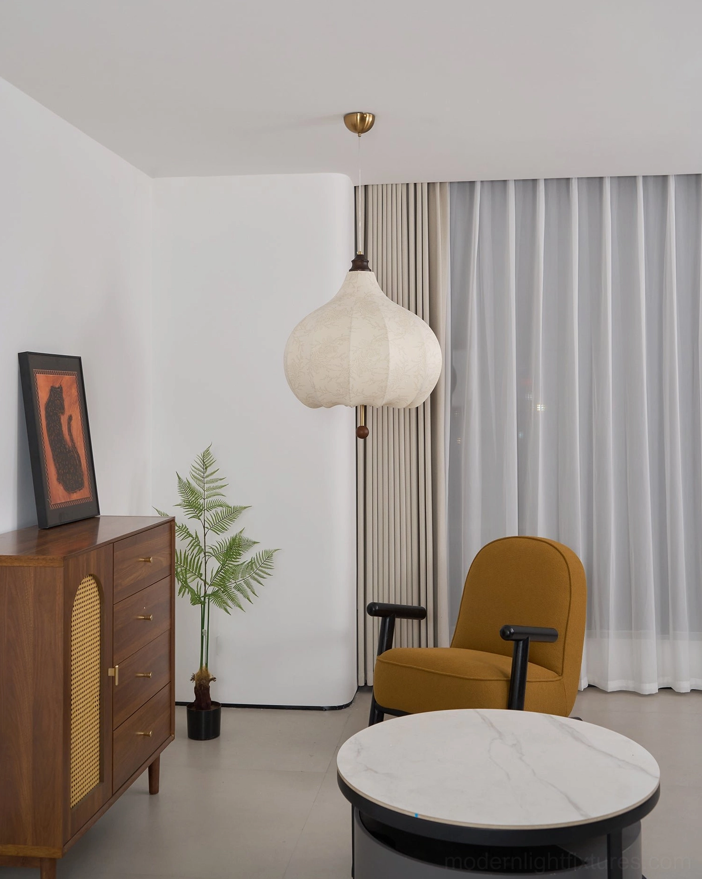 Botanical fabric pendant light demonstrating dimmer compatibility and adjustable light levels
