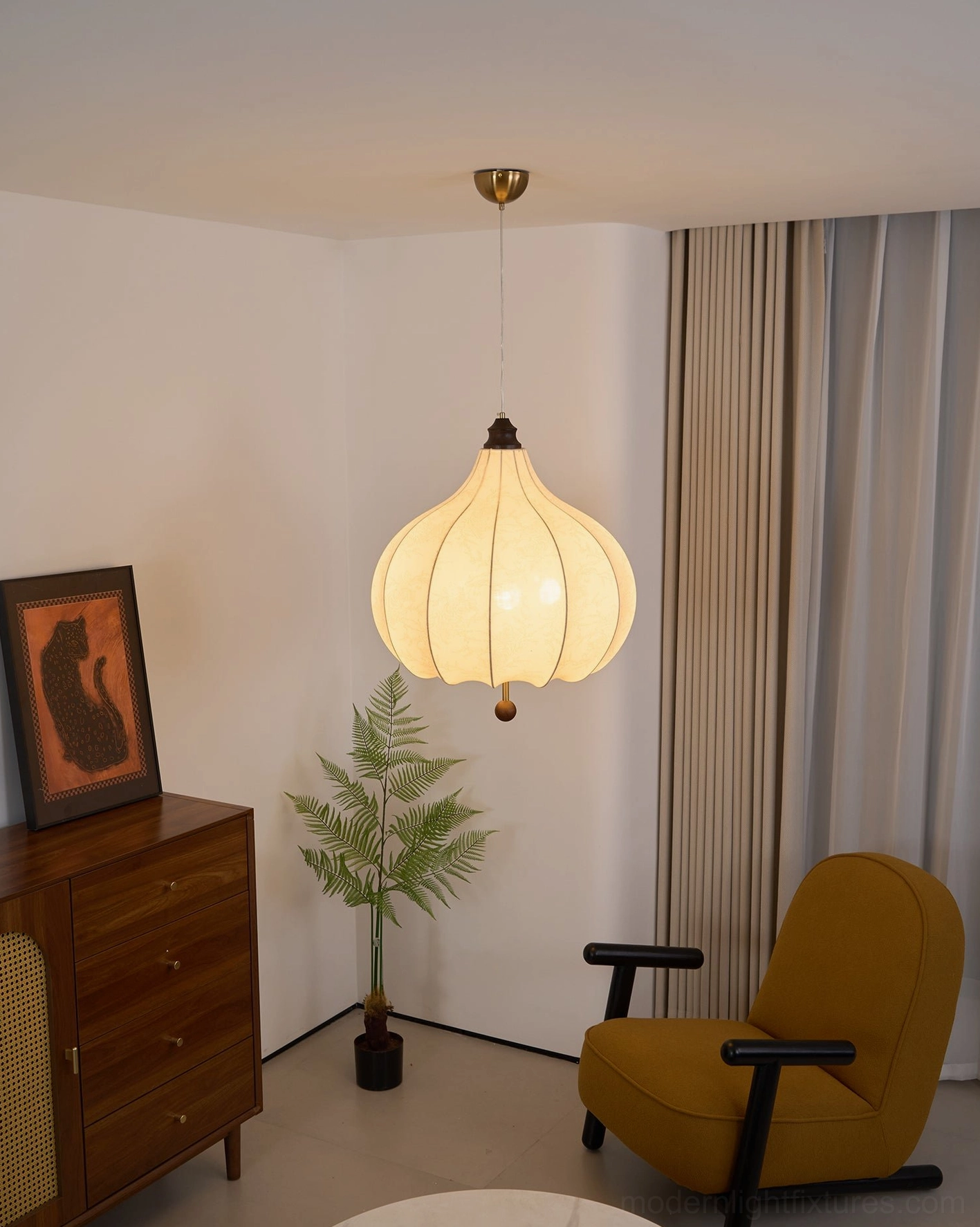 Botanical pendant lamp showing scale in high ceiling kitchen or dining area application