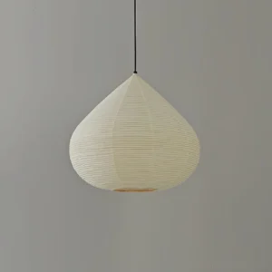Japanese chestnut pendant light with matte black cord displaying warm ambient illumination