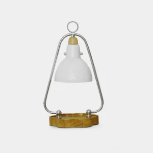 Modern candle warmer table lamp with chrome metal frame, white glass shade, and flower-shaped wooden base - front studio view
