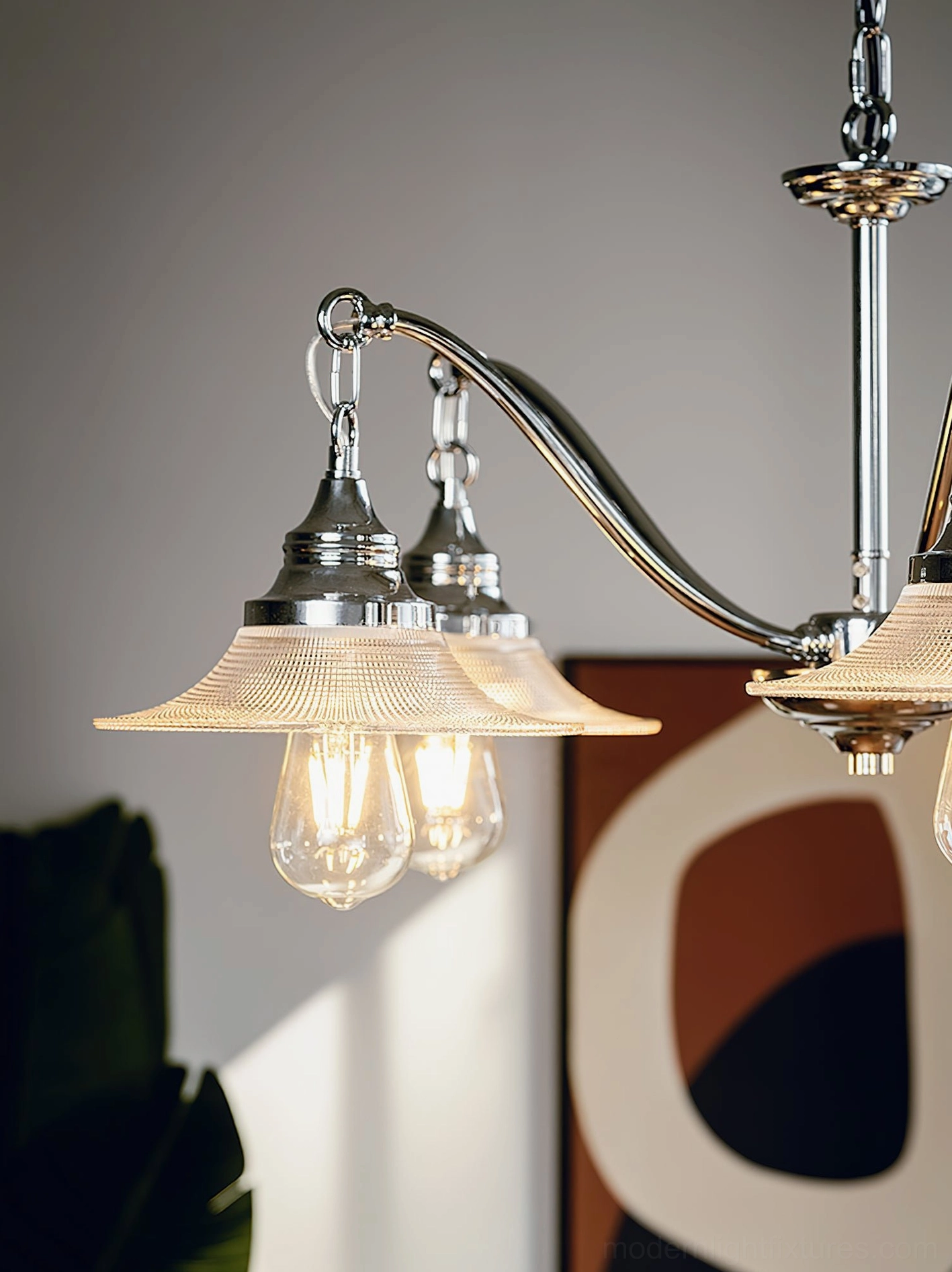 Modern chrome pendant chandelier 5-head configuration in transitional interior design space