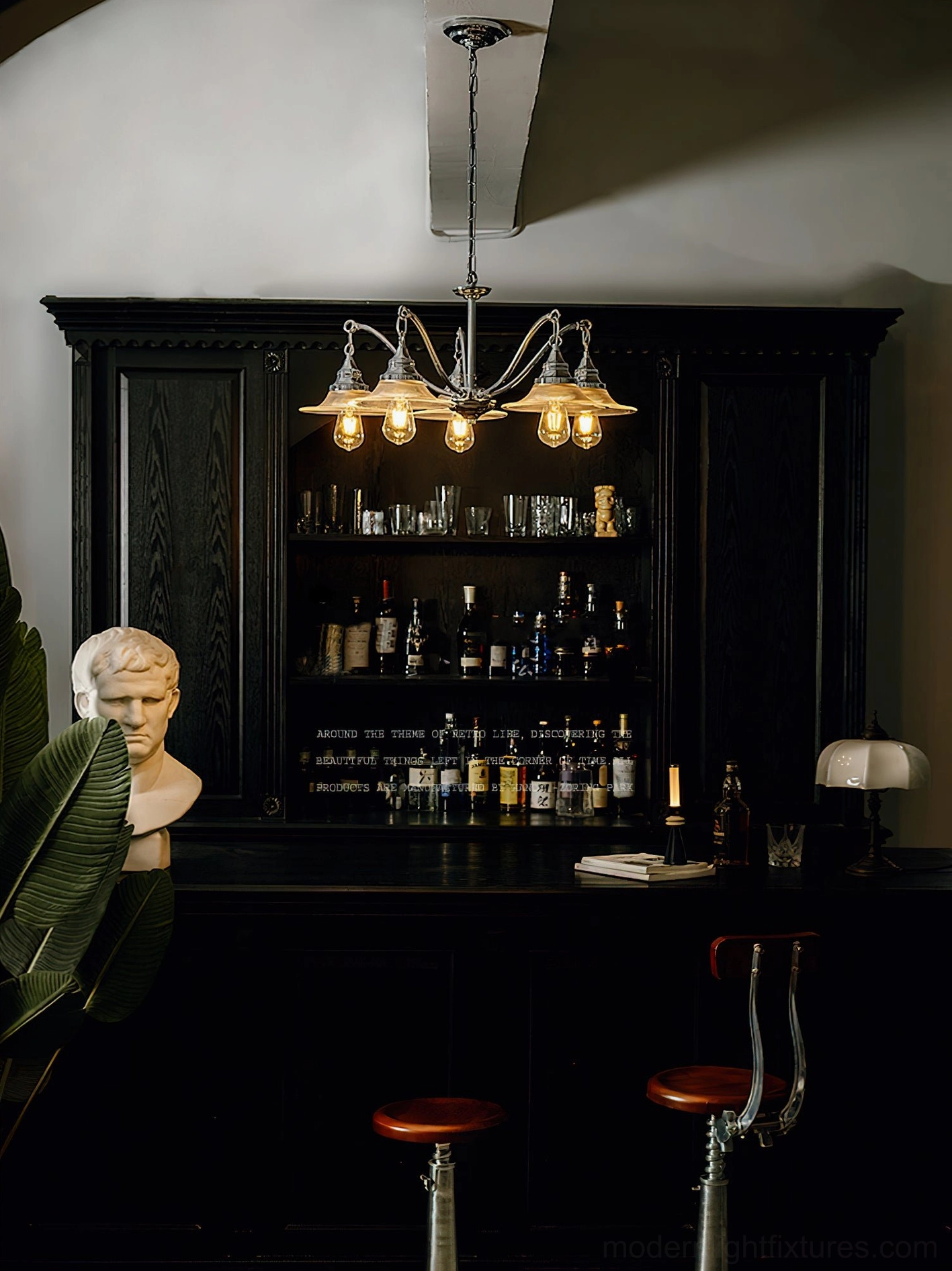 Modern chrome chandelier multi-head configuration showing curved metal arms and light diffusion