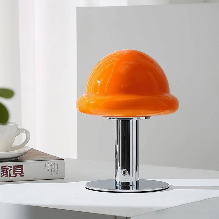 Chrome and orange mushroom rechargeable table lamp demonstrating bold contemporary color pairing
