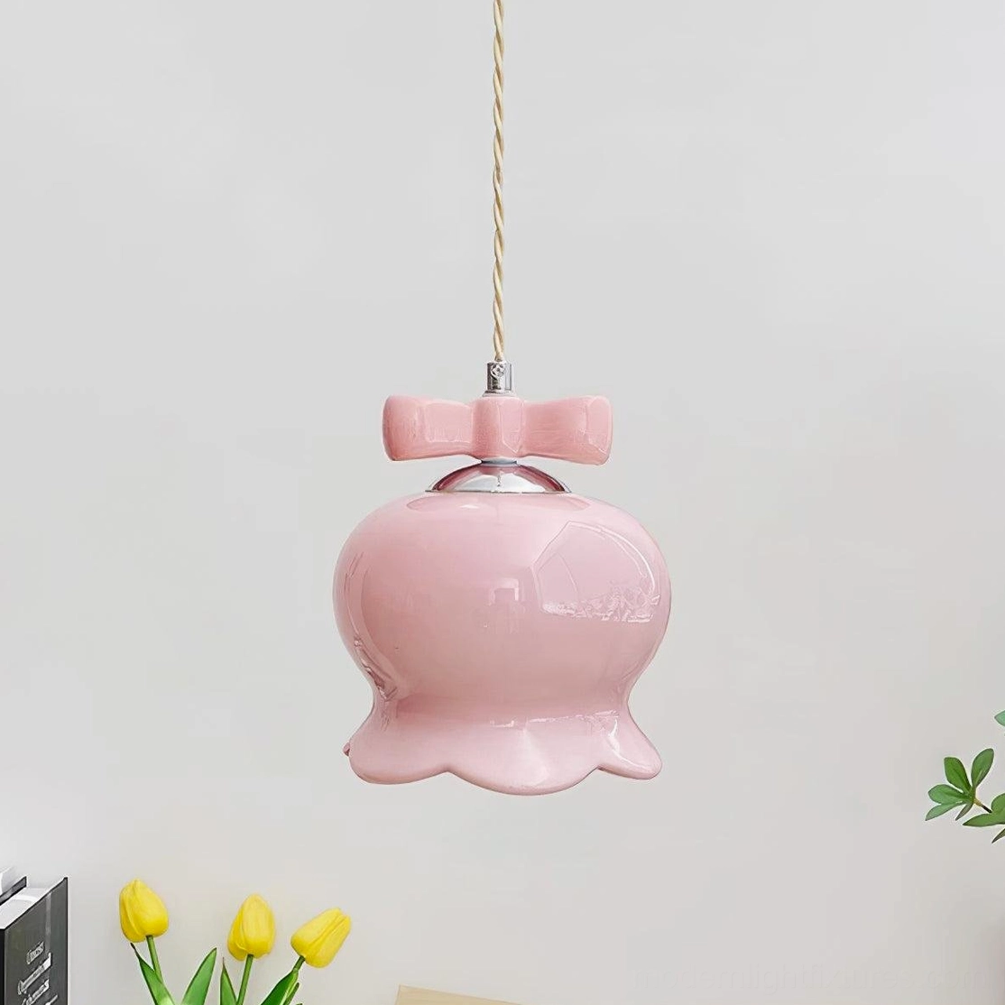 Chrome and pink ceramic pendant light fixture highlighting contemporary design aesthetic