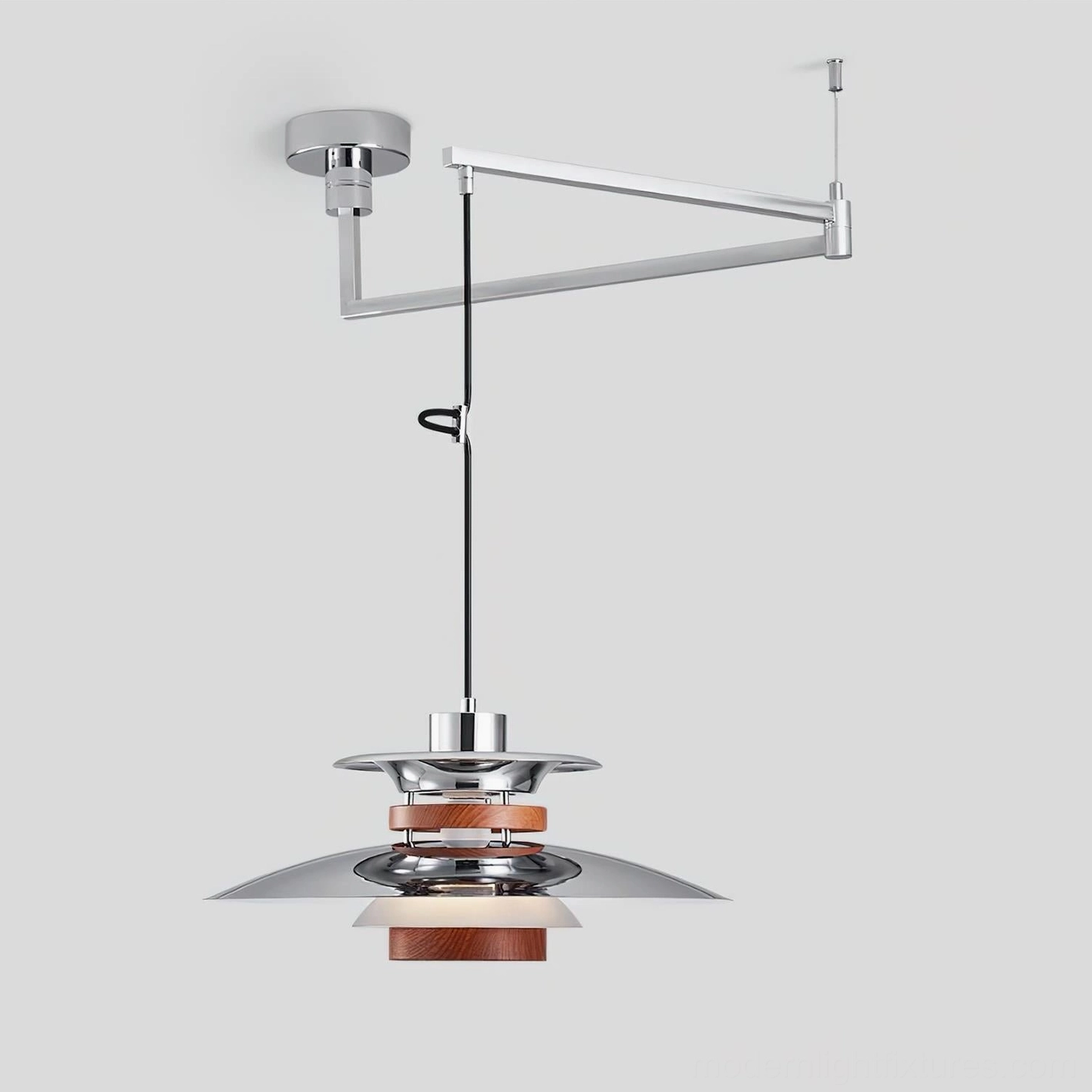 Chrome swing arm pendant light fixture, polished metal finish studio shot