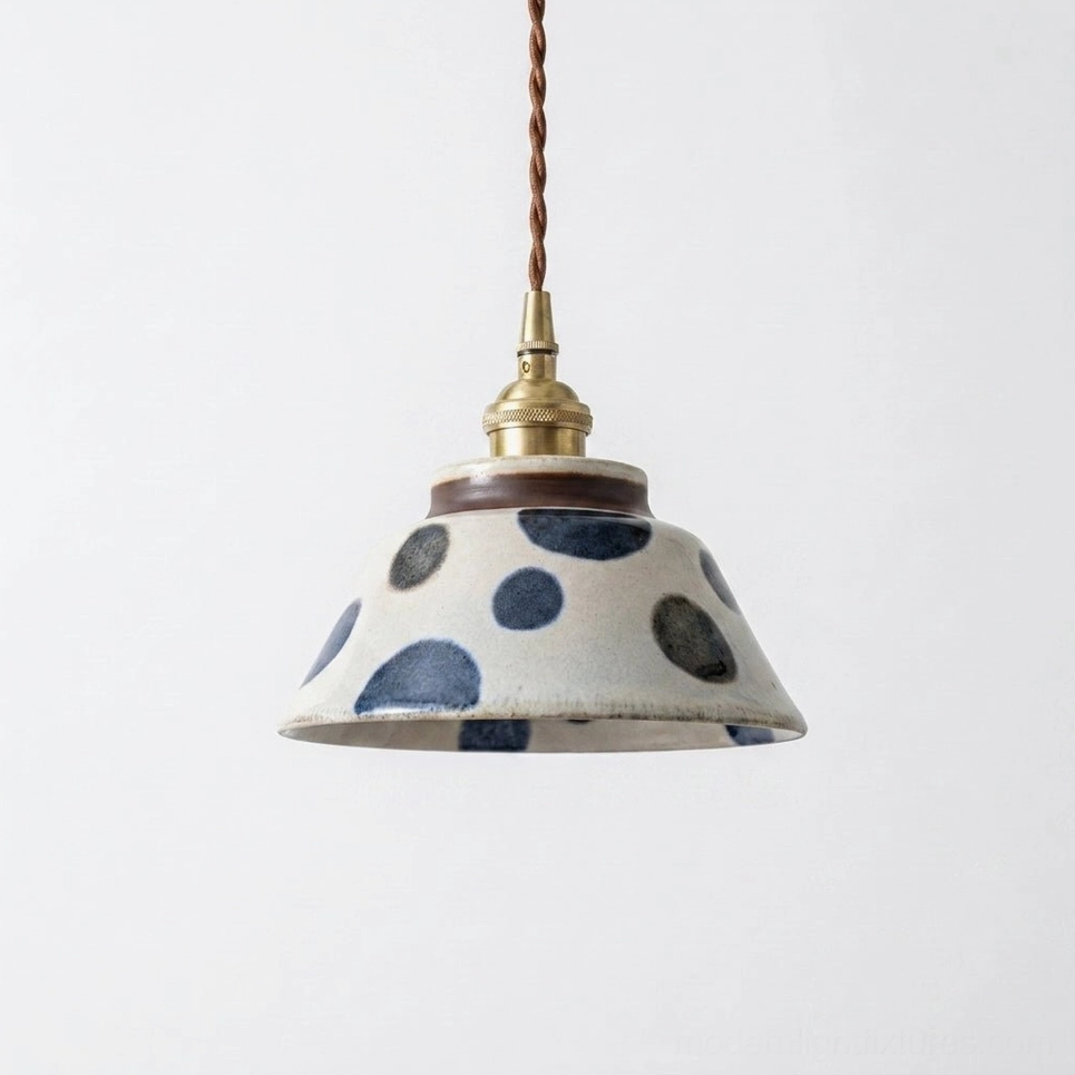 Chrysanthemum pattern hand-painted ceramic pendant shade on cream stoneware with indigo blue glaze and brass socket