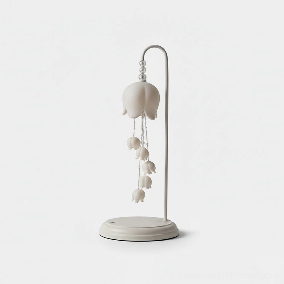 Chyme Charge white ceramic table lamp front view with bell-shaped pendants and matte finish