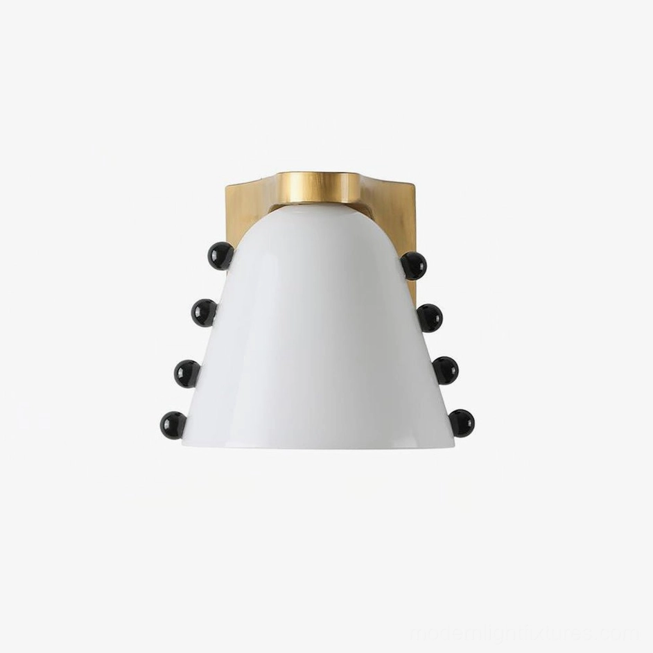 White frosted glass conical wall sconce with brass base featuring elegant black bead accents and modern architectural design