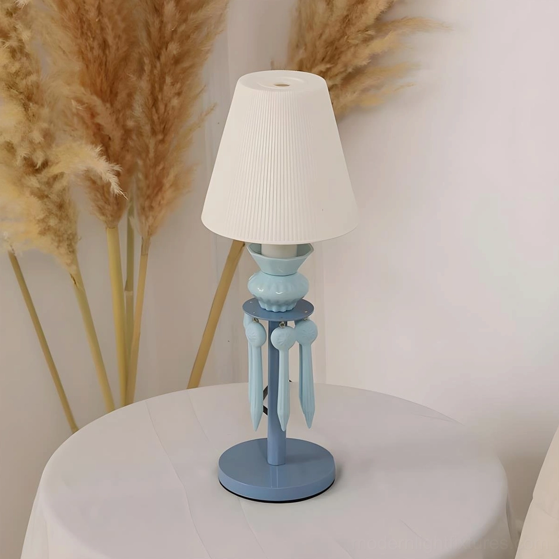 Cielora blue pastel tassel table lamp showing mid-century modern design elements and ceramic base craftsmanship