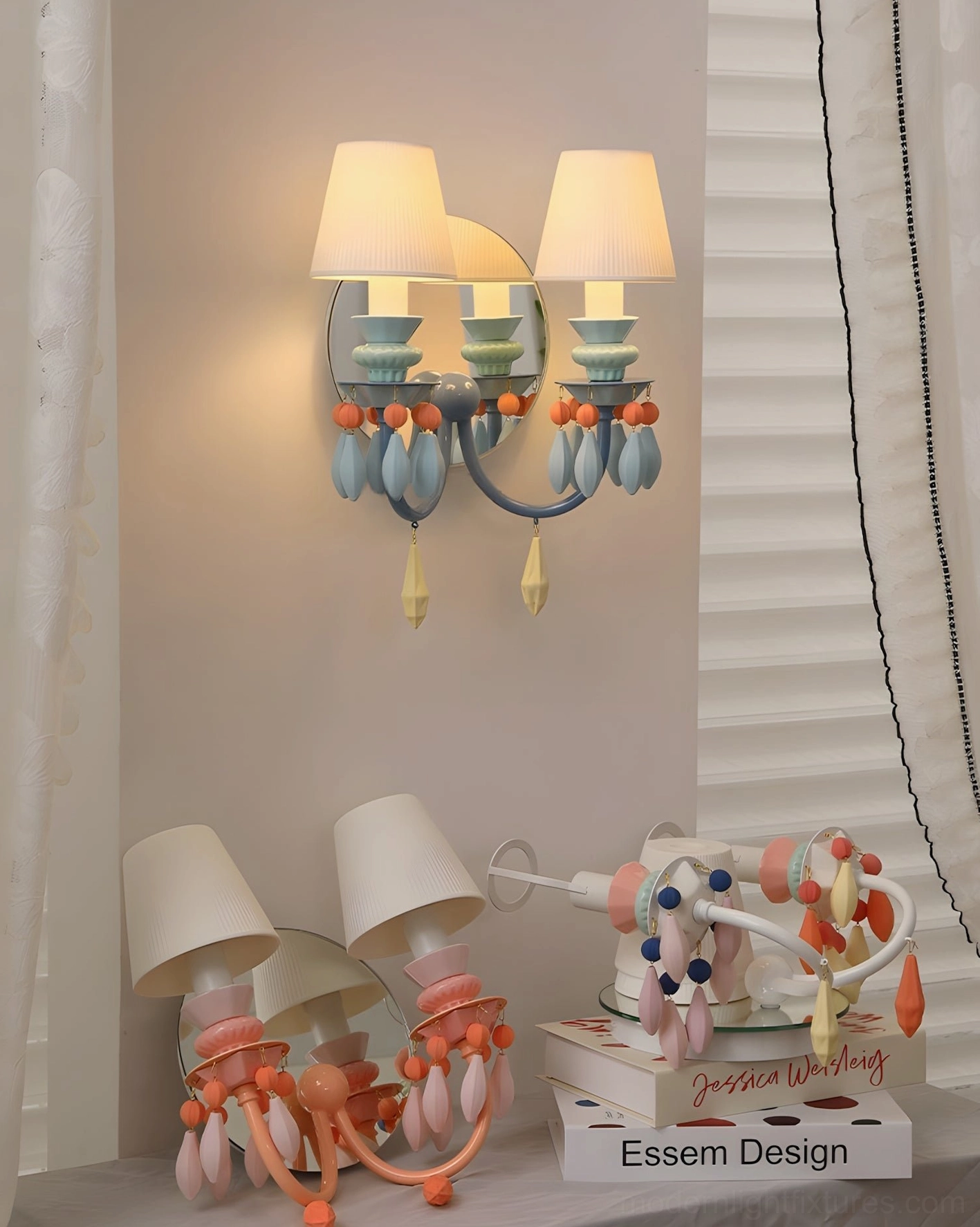 Cielora modern dopamine wall sconce with blue and coral ceramic accents displayed in contemporary home décor retail setting