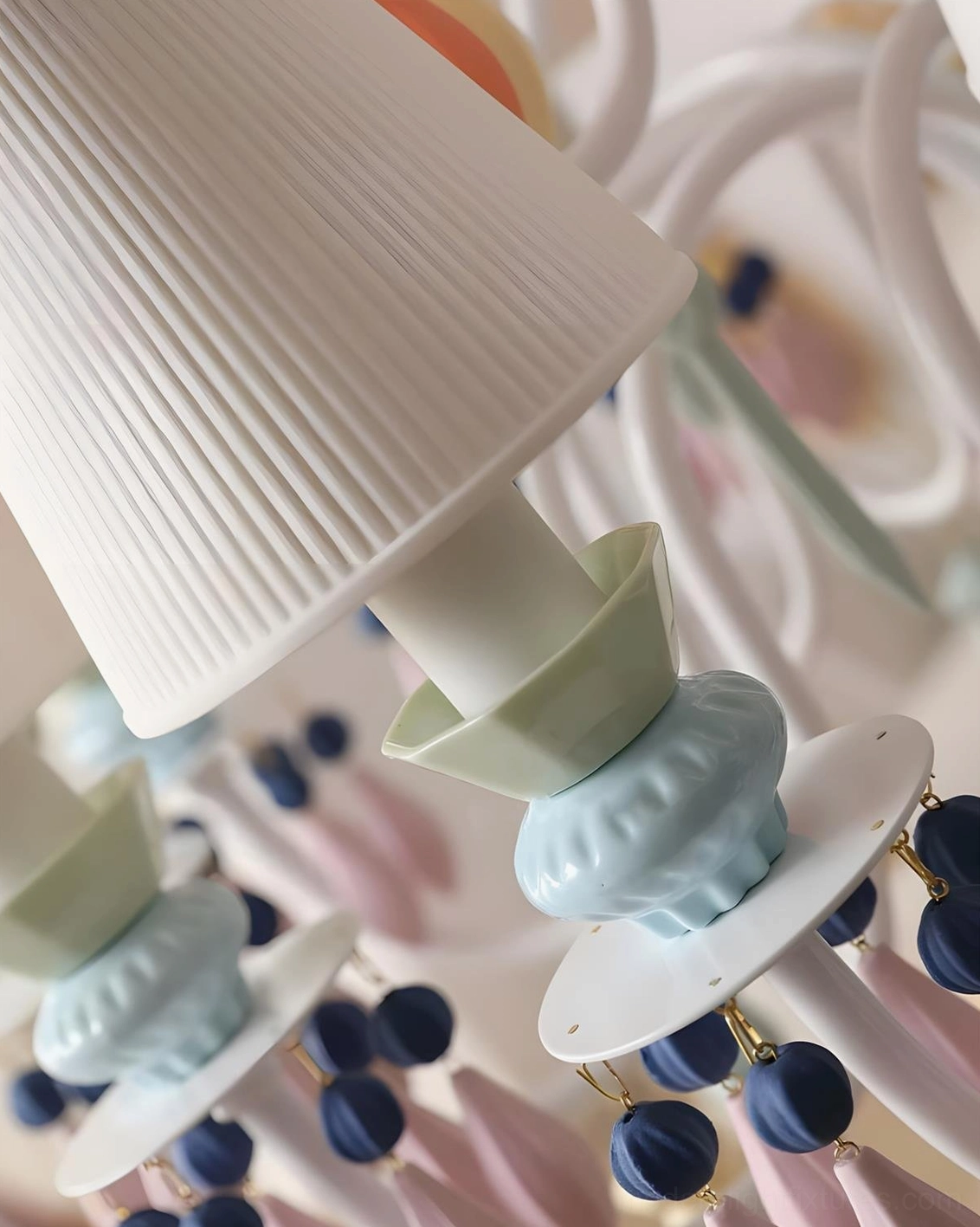 Cielora ceramic chandelier glow effect with warm light radiating through ceramic shade diffusion