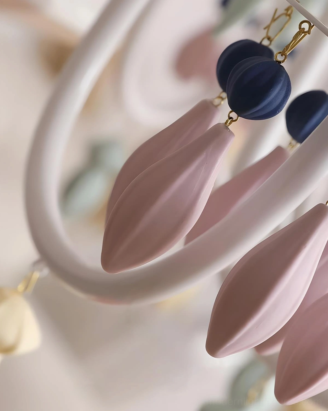 Cielora ceramic chandelier mid-century modern aesthetic showing artistic sculptural silhouette