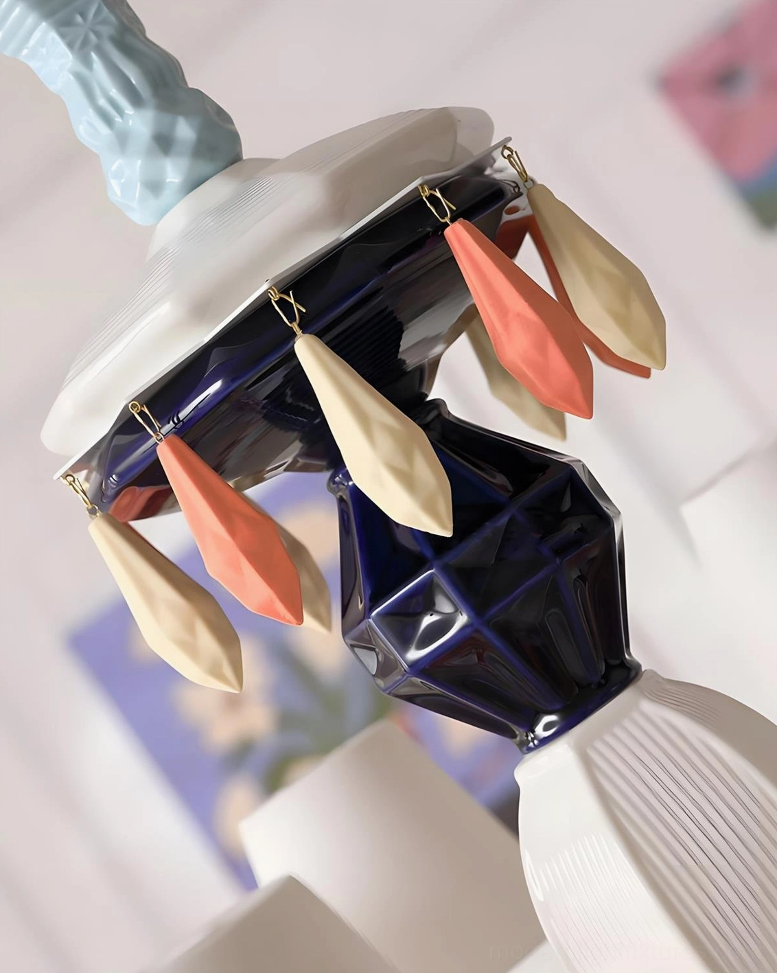 Cielora multi-tier ceramic chandelier whimsical design elements with hanging decorative accents
