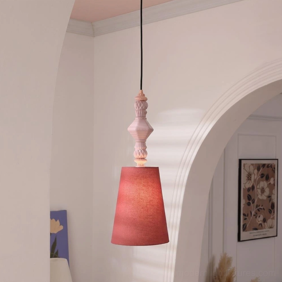 Terracotta red conical shade pale pink ceramic totem pendant light in minimalist white arched hallway, contemporary design