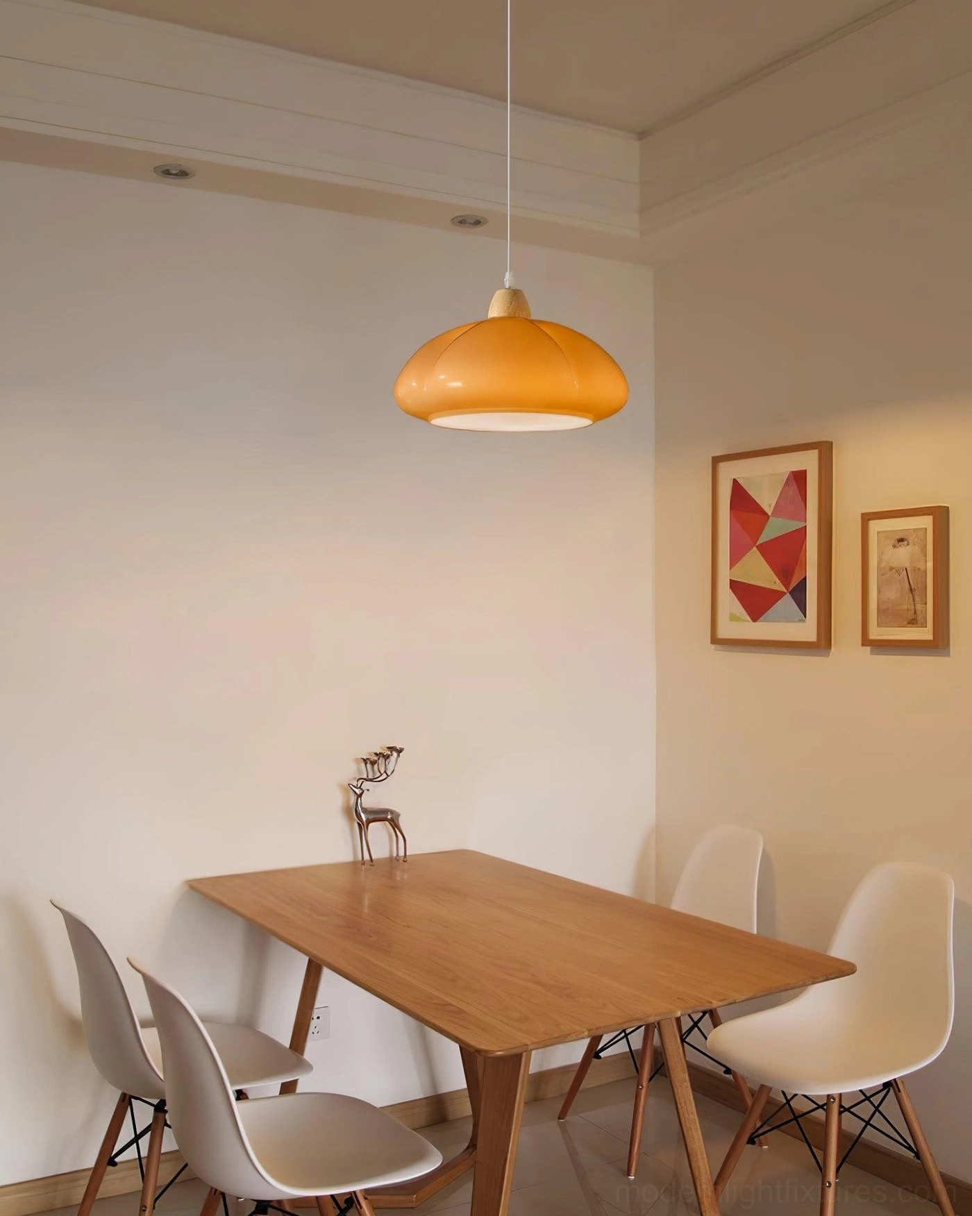 Cipola creamy beige pumpkin pendant lamp with warm soft glow in living room setting