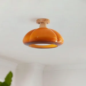 Cipola ceiling light fixture with amber glass shade mounted on residential ceiling, overhead angle