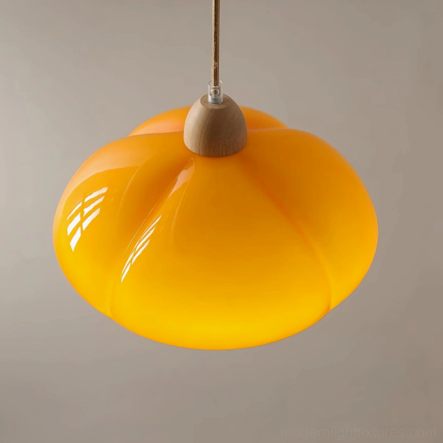 Cipola warm orange pumpkin pendant light creating sculptural statement in modern home office