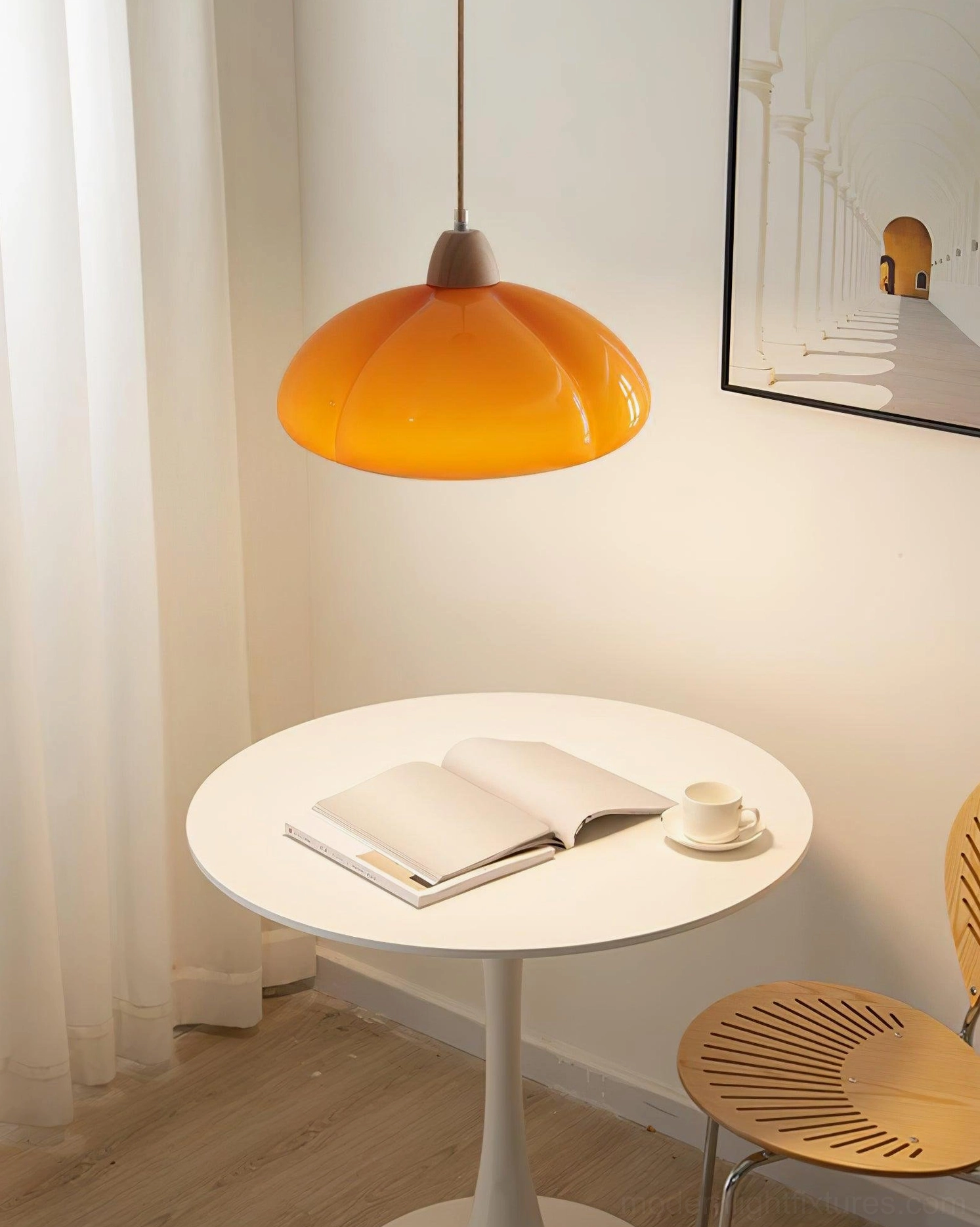 Cipola soft white pumpkin pendant lamp installed over dining table for intimate lighting