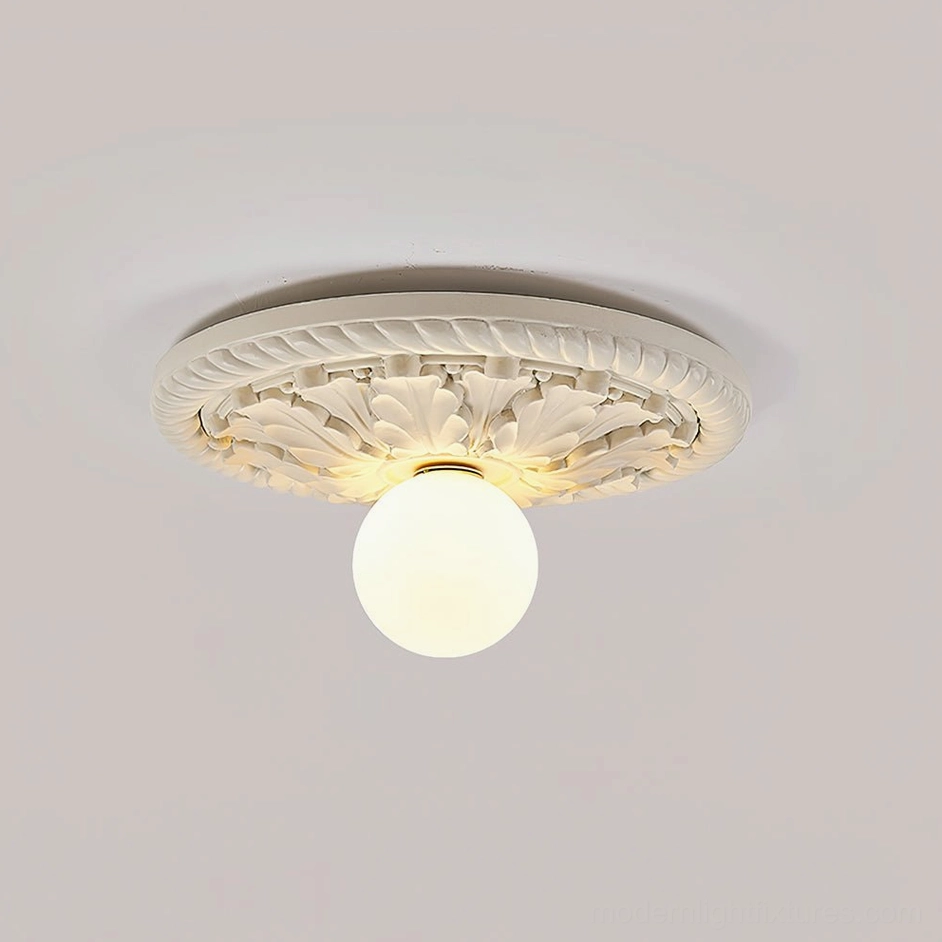Circa beige ceiling light fixture installed in classic French country interior hallway