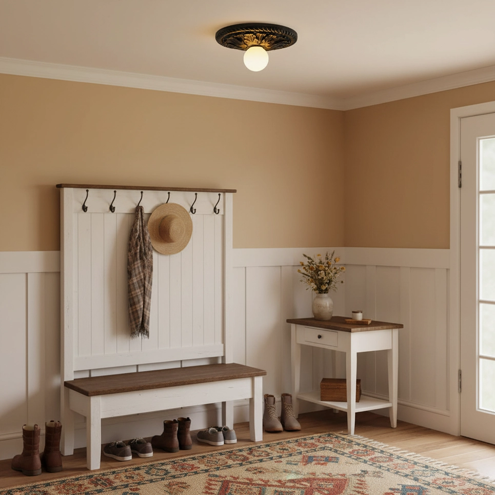 Circa black bronze ceiling light fixture in warm traditional entryway with frosted spherical bulb