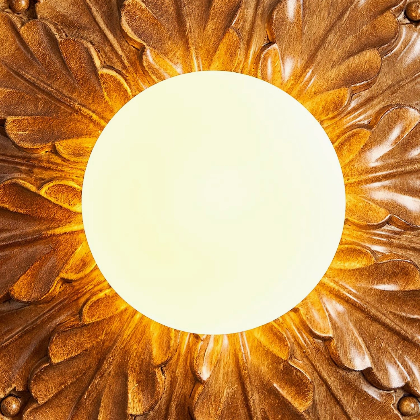 Circa ceiling light fixture mounted as decorative wall sconce with ornamental relief detail