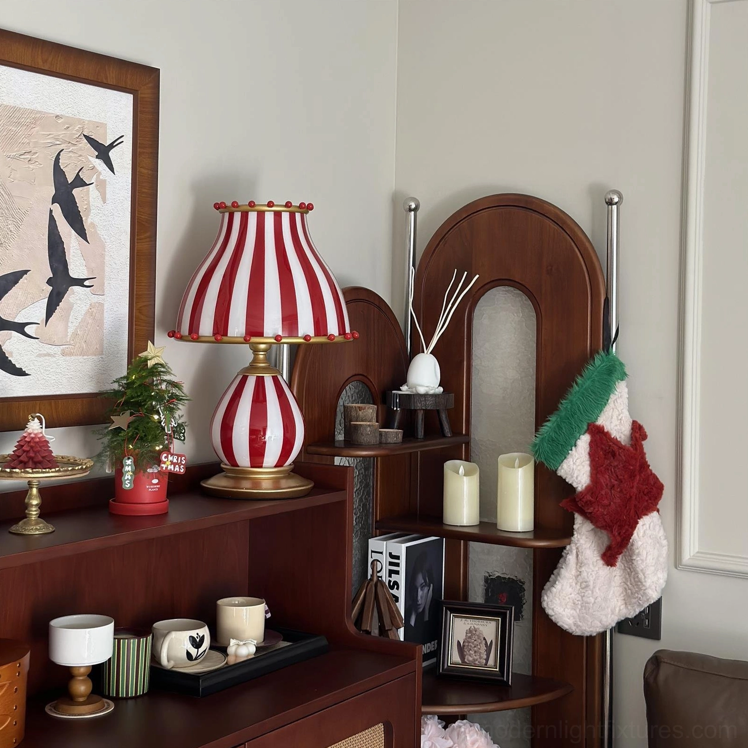 Red and white striped carnival table lamp in festive holiday entryway decoration