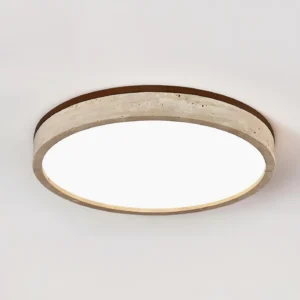 Cirona round LED ceiling lamp centered front profile showing slim design and natural stone frame with integrated lighting