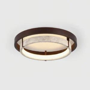 Cirvela flush mount ceiling lamp, angled perspective displaying textured stone accent and warm glowing diffuser