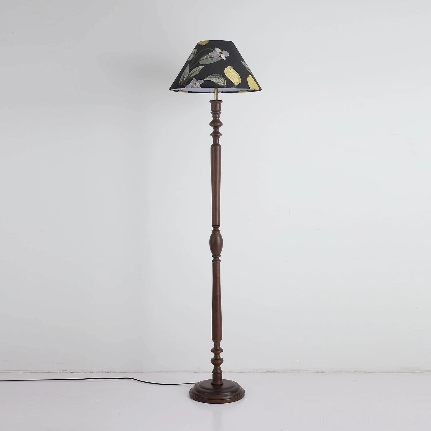 Citrina floor lamp with embroidered citrus pattern shade on studio background
